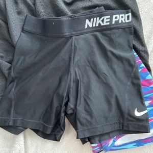 4 pairs of Nike pros